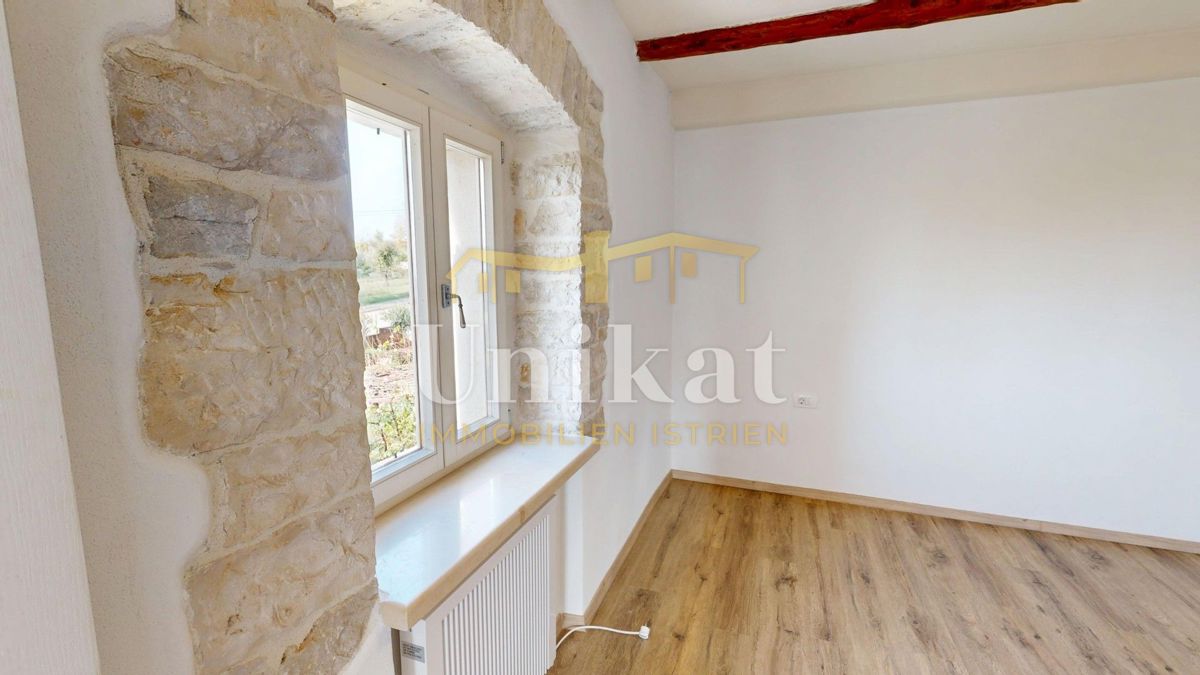 Dvojna hiša z garažo in velikim vrtom